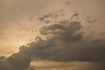 Beautiful sunset sky above clouds with dramatic light