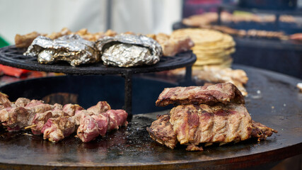 Cooking meat on fire. Traditional street food.