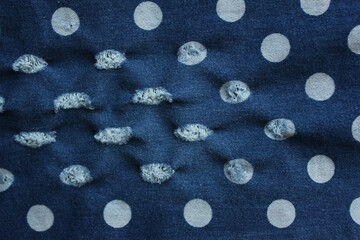 Hole and Threads on dot Denim Jeans
