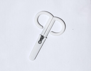 Scissors hand-operated cutting instruments. Scissors for cutting paper and thin materials, object is isolated on white background . 