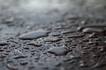 water drops on a wood surface