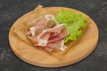 Italian prosciutto pork meat over board