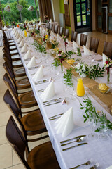 Wedding table decoration with flowers.
