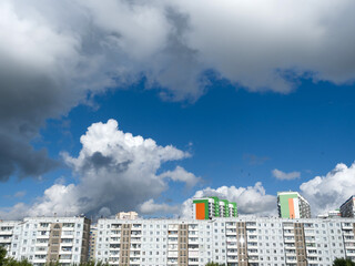 Beautiful sky over residential urban areas. Summer day