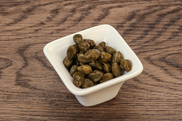 Tasty capers in the bowl