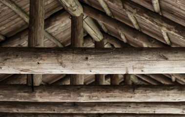 Wooden roof details. Rough logs