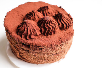 chocolate truffle cake isolated on white background and rose