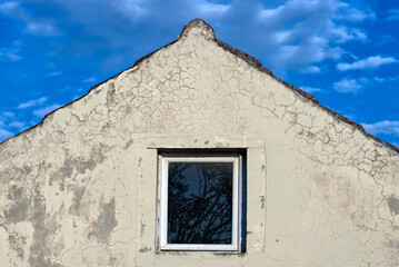 Detail of a house facade with side view and roof