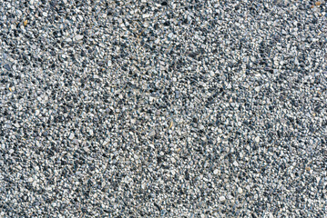 Texture of tiny gravel stone decoration on wall