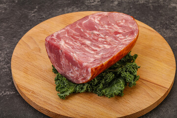 Beef ham piece over board