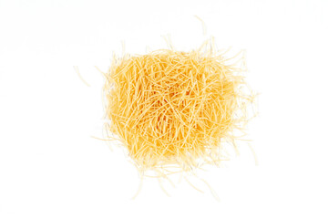 Top view of uncooked vermicelli pasta on white background. Dry uncooked vermicelli pasta