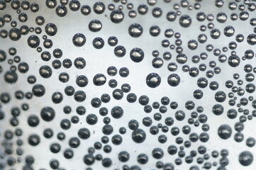 Fototapeta Air bubbles in a bright space in a metallic glow obraz