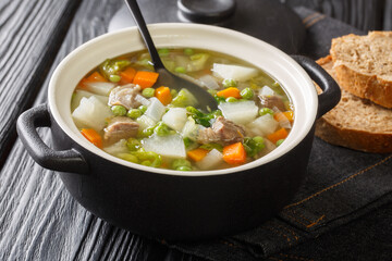 Hairst Bree Harvest Broth traditional Scottish recipe for a classic hearty broth of lamb meat mixed summer vegetables. Horizontal