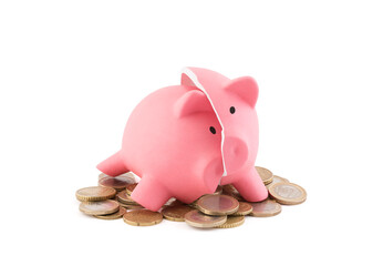 Broken piggy bank with coins on white background with clipping path