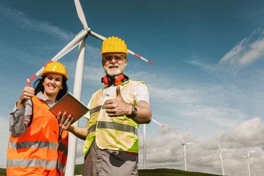 Windmill engineers inspection and progress check wind turbine