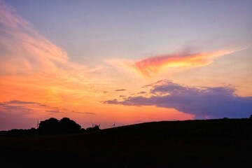 sunrise or sunset over the field