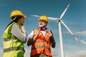 Windmill engineers inspection and progress check wind turbine