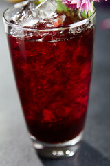Freshness cocktail with cherry and ice cube