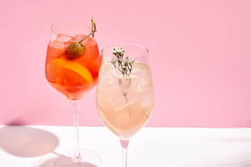 Aperol Spritz Cocktail on pink background