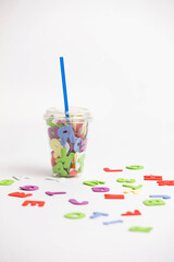 alphabet in plastic cup