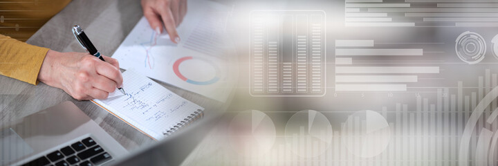 Businesswoman working on marketing data; panoramic banner