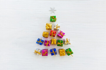 Christmas tree made of colorful presents and gifts.