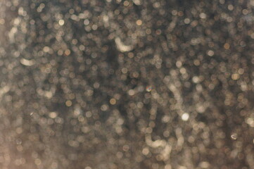 Large air bubbles in a dark space with a metallic glow