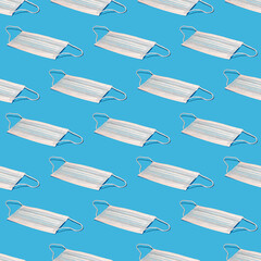 Seamless pattern with medical hygienic mask on blue background. medical pattern.