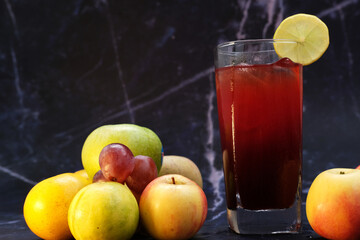 chill berry juice with ice on table and summer drinking