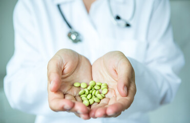 Healthcare - medication. Doctor with herbal drugs.