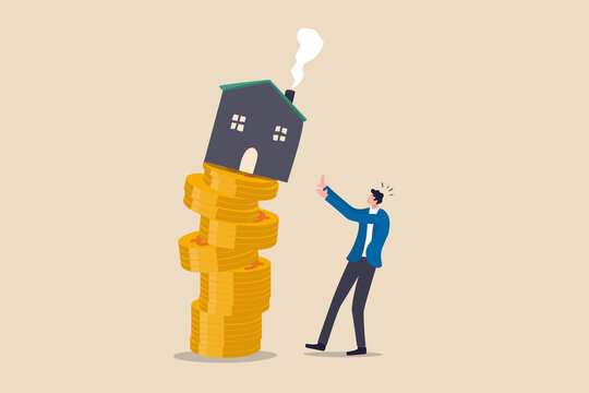 Property and housing market collapse, real estate stock risk or economic recession concept, businessman house owner or real estate agent help protect the house to fall off unstable stack of coins.