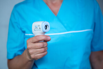 Healthcare - nurse with thermometer..