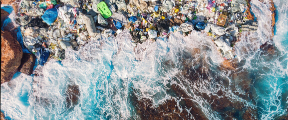 Concept environmental pollution ocean and water with garbage plastic and human waste. Aerial top view © Parilov