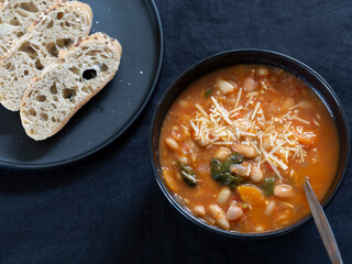 Homemade Ribollita, tuscan bean soup with light rye ciabatta