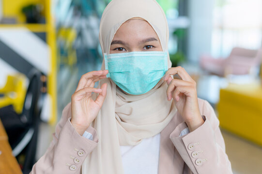 Muslim Woman Wearing Face Mask During Virus Pandemic. 