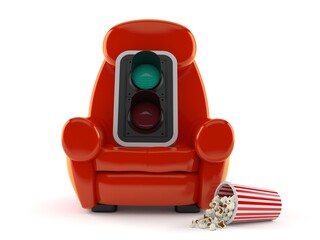 Green traffic light with theater armchair and popcorn