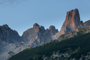 Naranjo de Bulnes, known as Picu Urriellu, from Camarmeña village at dawn in Picos de Europa National Park, Asturias in Spain © Noradoa