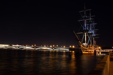 Fototapeta na wymiar ship on river in the night city view