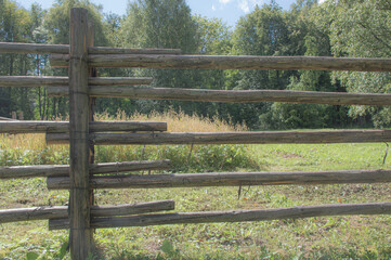 old fence and gate in the countryside 