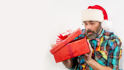 modern Santa with a christmas gift isolated over white