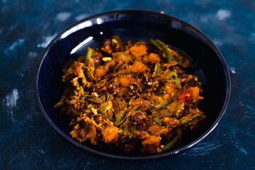 plant-based food, mixed vegetables and red kidney beans with spicy sauce