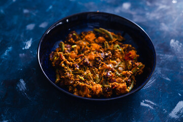 plant-based food, mixed vegetables and red kidney beans with spicy sauce