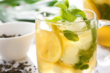 Cup of tasty cold ice tea, closeup