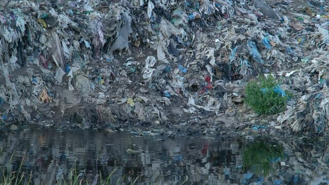 Big Waste and Garbage Dump Overflowing with Birds and Animals. Contaminated Earth and Human Products. Concept of Modern Society of Consumption and Environmental Pollution. Nature Polluted. Save Earth