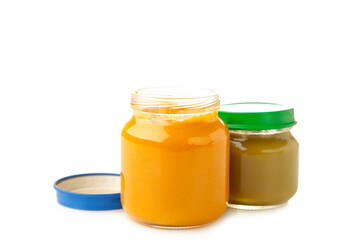 Glass jars with nutrient baby food isolated on white background