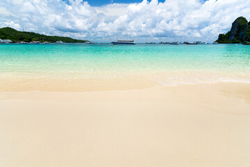 White sand  and wave on the beach at Phi Phi Island with blue sea. With Copy space for insert text...