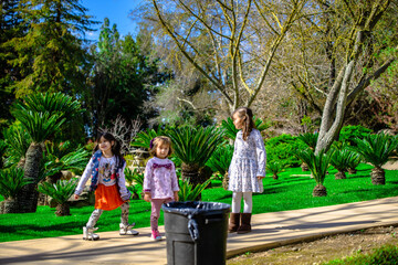 Obraz premium little preety girls playing on the park family time 