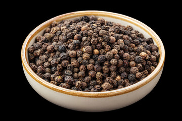 PSD black peppercorns in a bowl isolated on black 