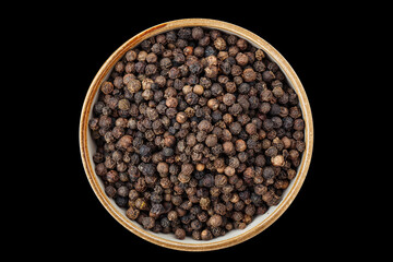 PSD black peppercorns in a bowl isolated on black 