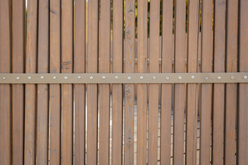 wooden fence made of vertical boards, wooden fence,